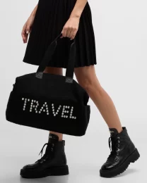 BTB Los Angeles Travel Bags in black faux fur with the word TRAVEL written in polycarbonate embellishments